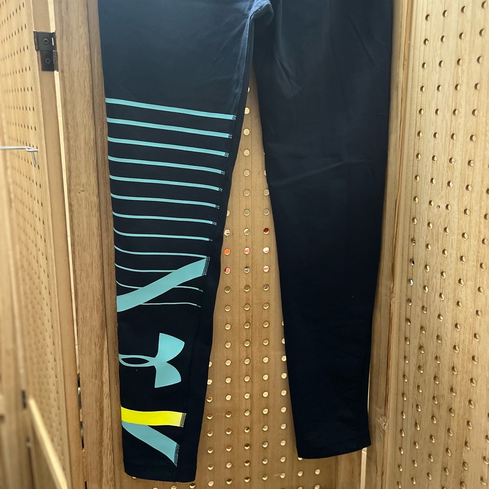 Brand New! Under Armour women’s leggings, dark and ocean blue accents. Casual.